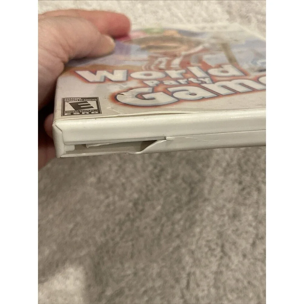 World Party Games (Nintendo Wii) TESTED COMPLETE CASE DISC BOOK Video Game